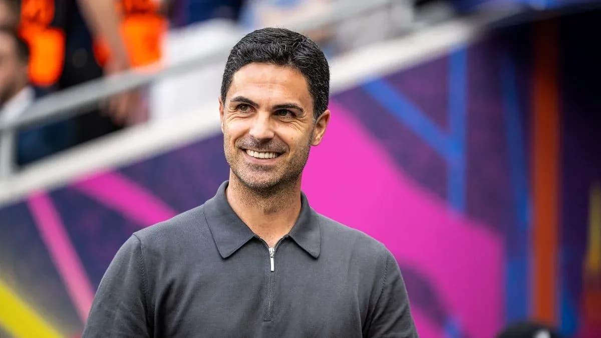 Coach smiling before the match in stadium