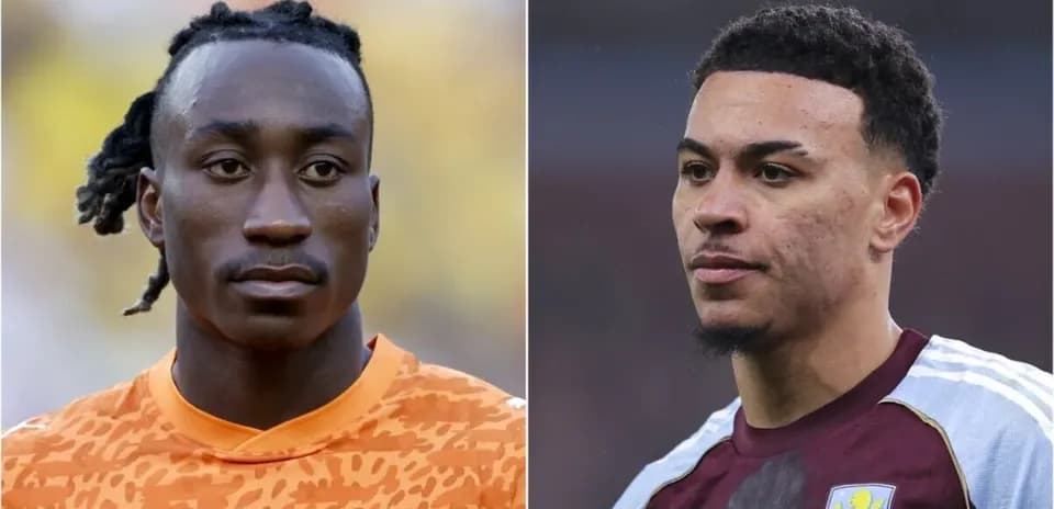 Two football players posing for a portrait