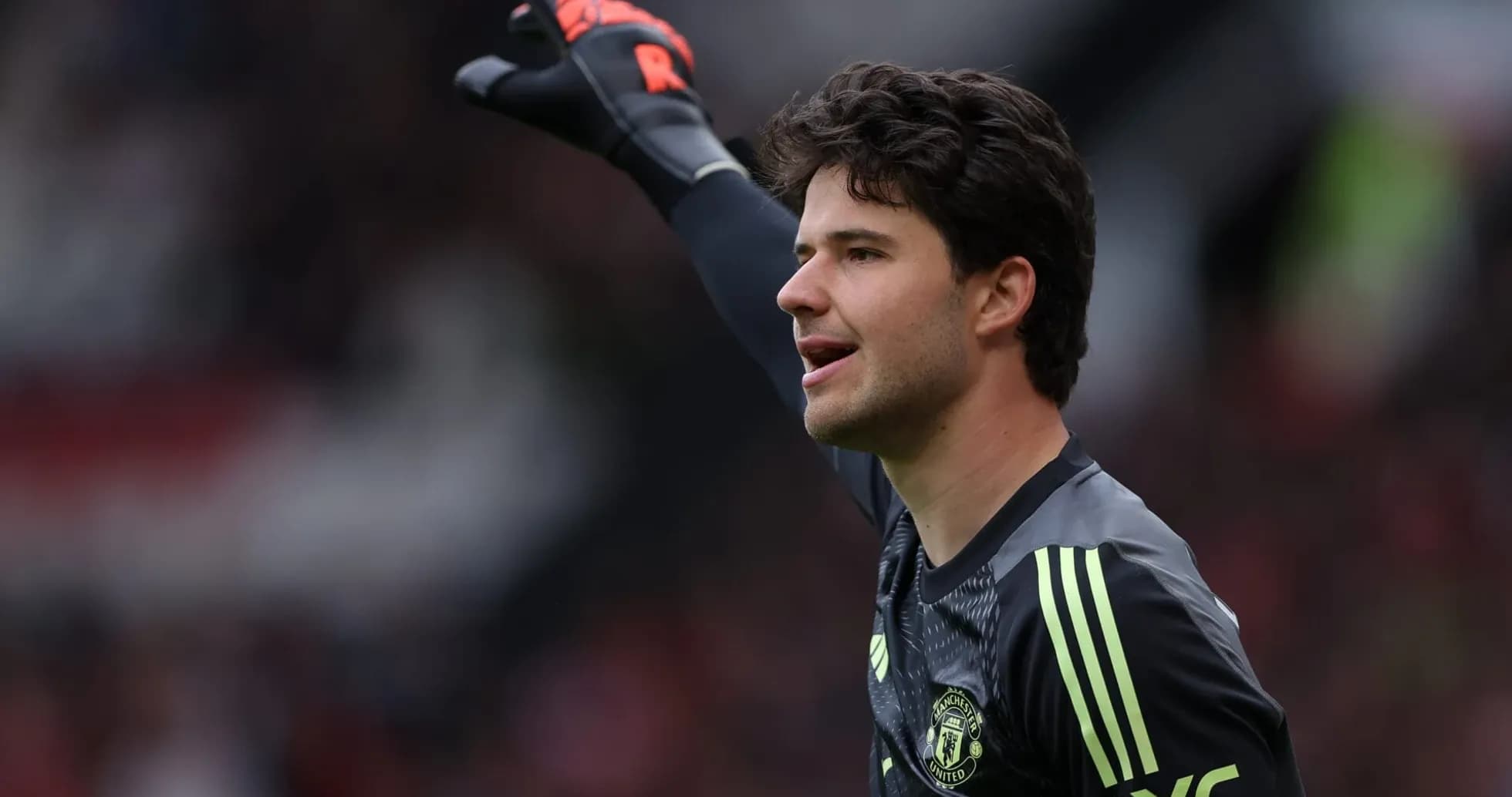 Goalkeeper gesturing during a match for Manchester United