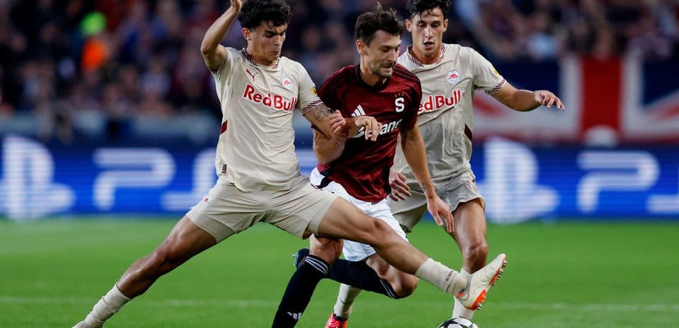 Players competing for the ball during match