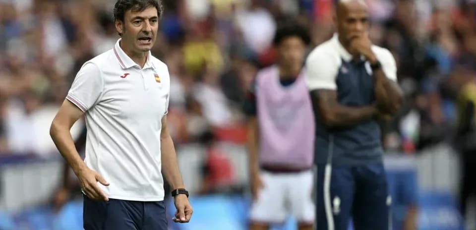 Coach giving instructions during match on sidelines