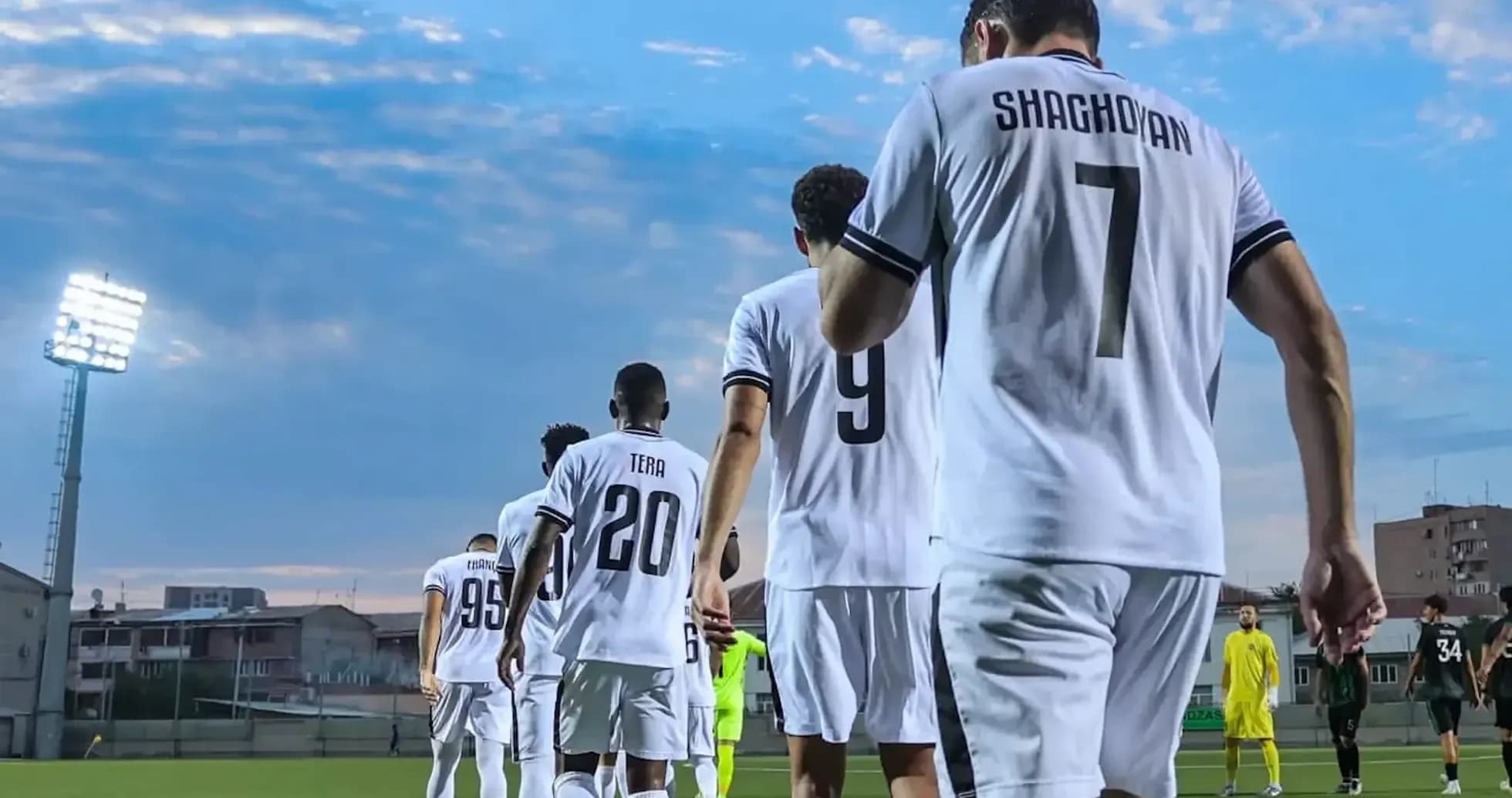 Players walking onto the pitch before the match