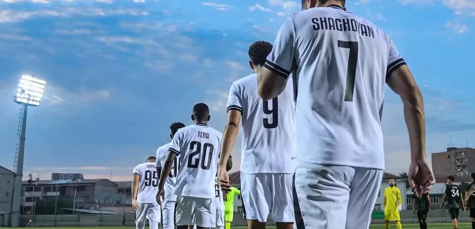 Players walking onto the pitch before the match