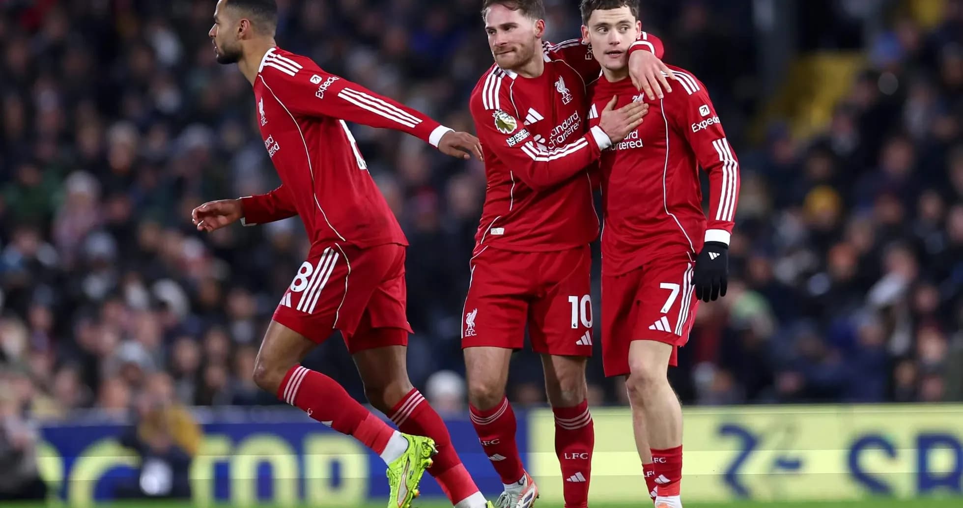 Liverpool players celebrating a goal during match