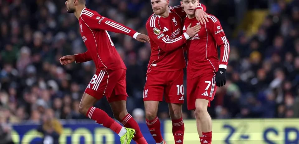Liverpool players celebrating a goal during match