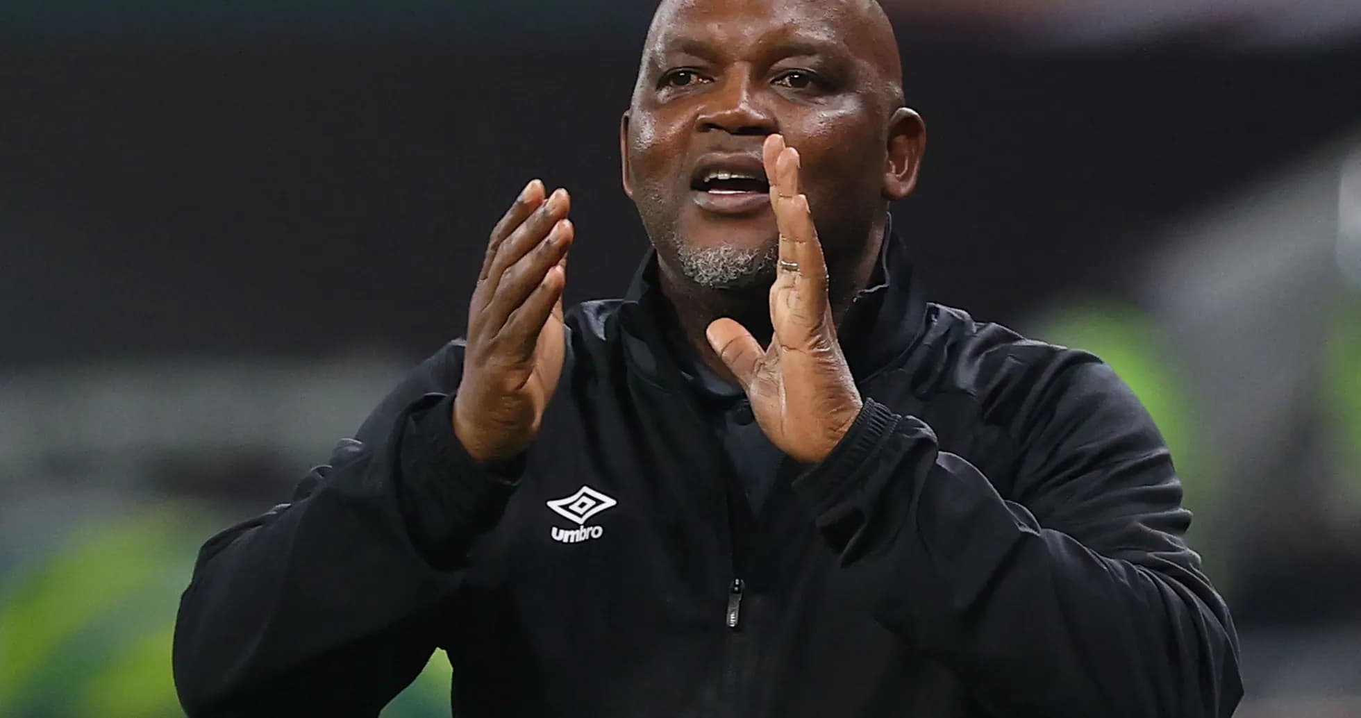Coach giving instructions during match on sideline
