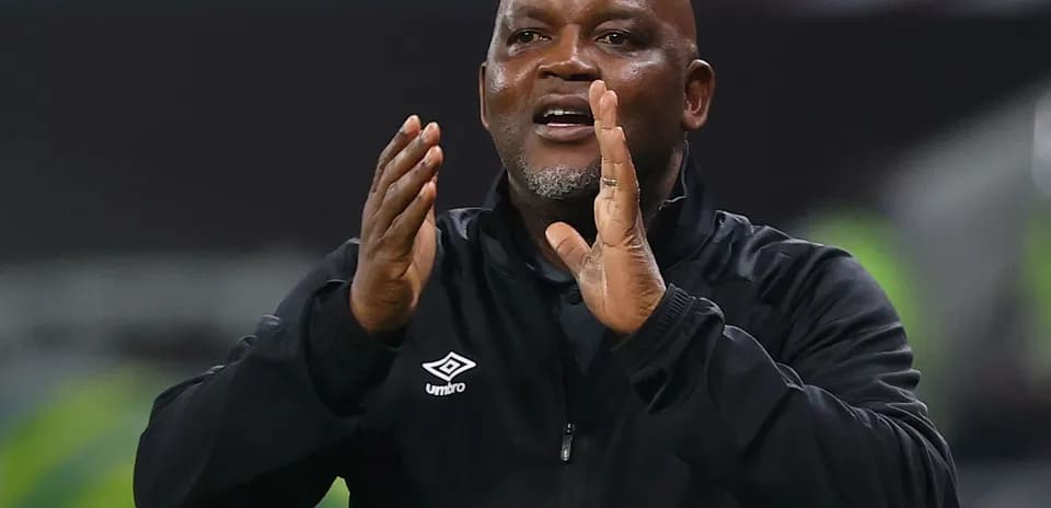 Coach giving instructions during match on sideline