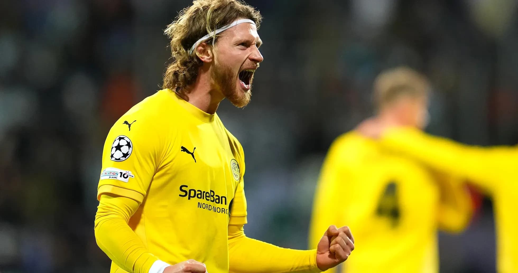 Goalkeeper celebrating during UEFA Champions League match