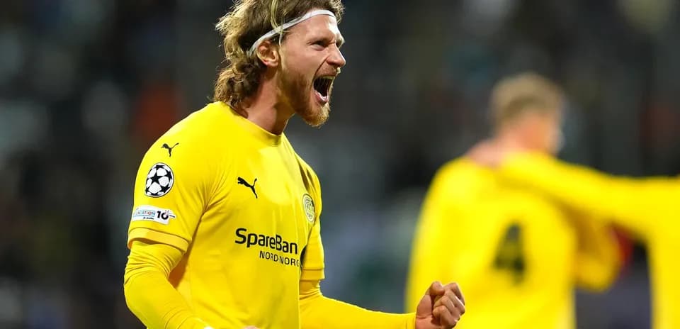 Goalkeeper celebrating during UEFA Champions League match