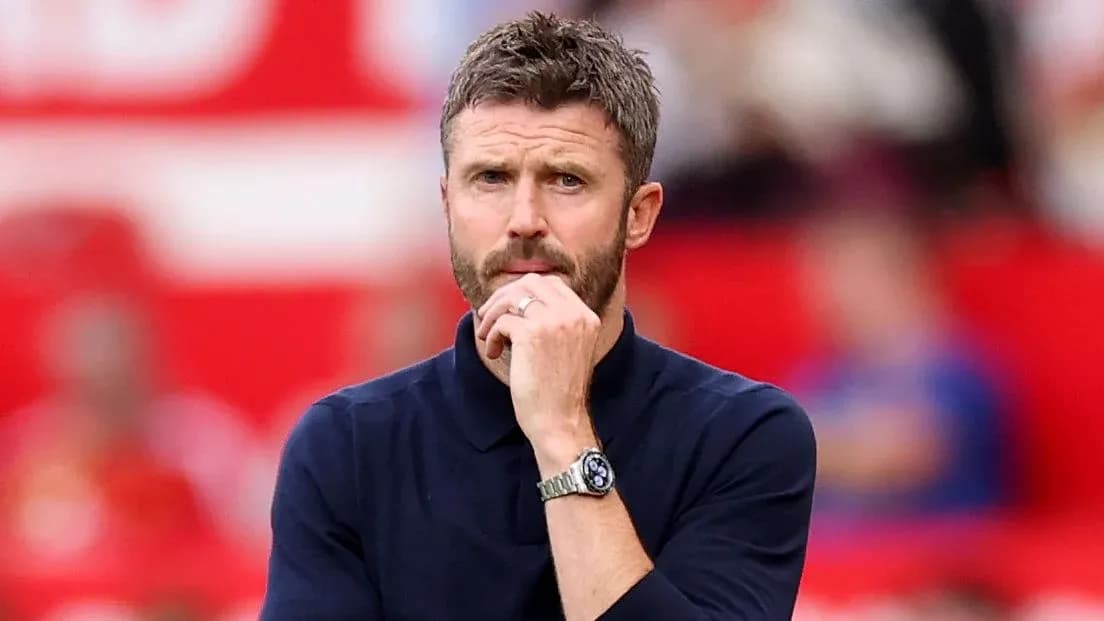 Coach observing the match from the sidelines