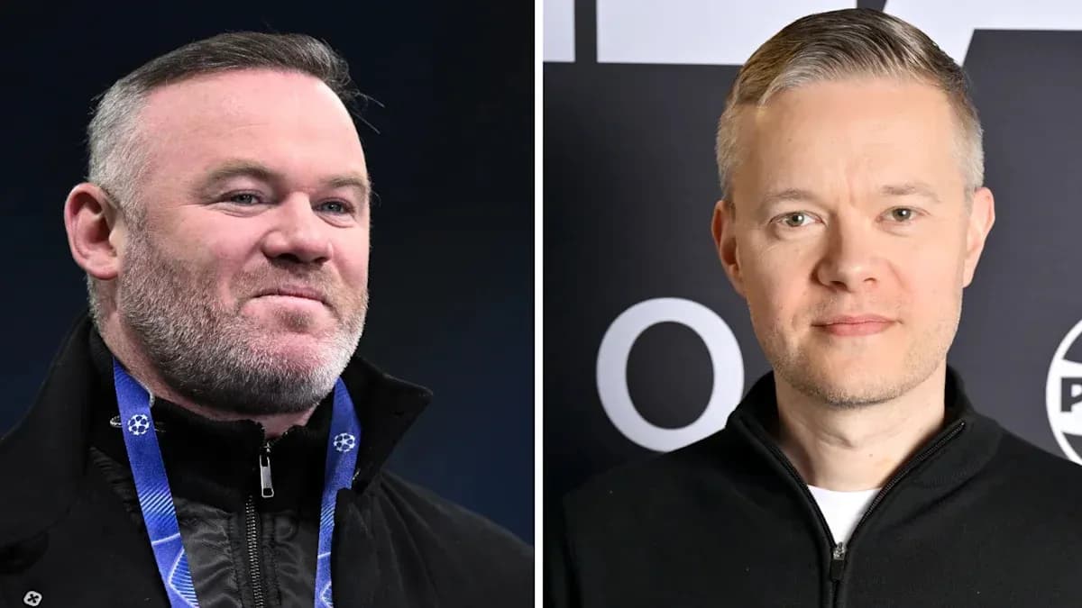 Two men posing for photos at an event