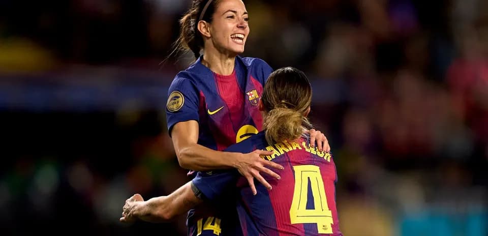 Barcelona players celebrating a goal on the field