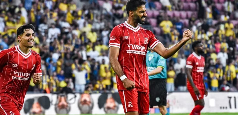 Hapoel Beer Sheva players celebrating during match