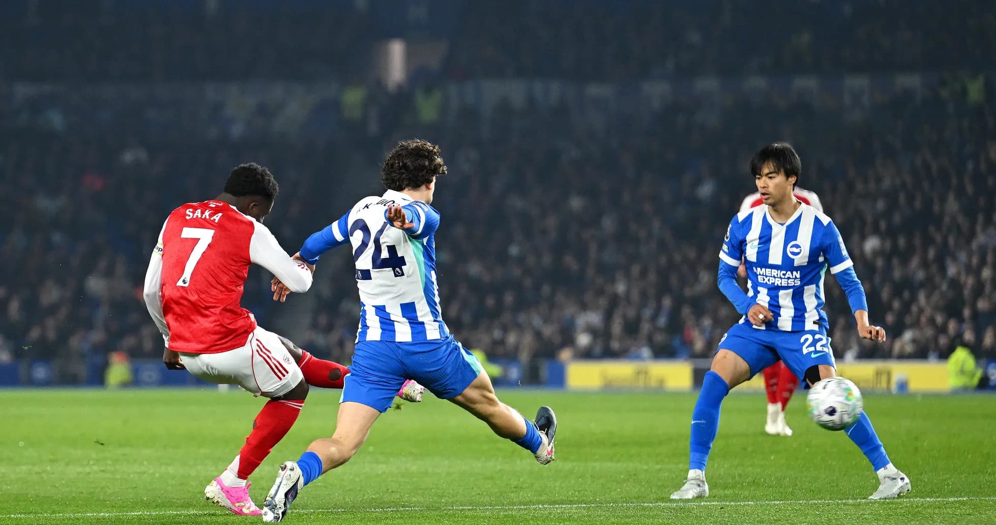 Saka attempting a shot against Brighton