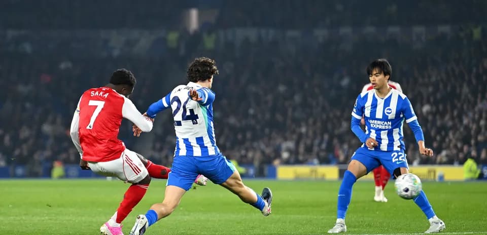 Saka attempting a shot against Brighton