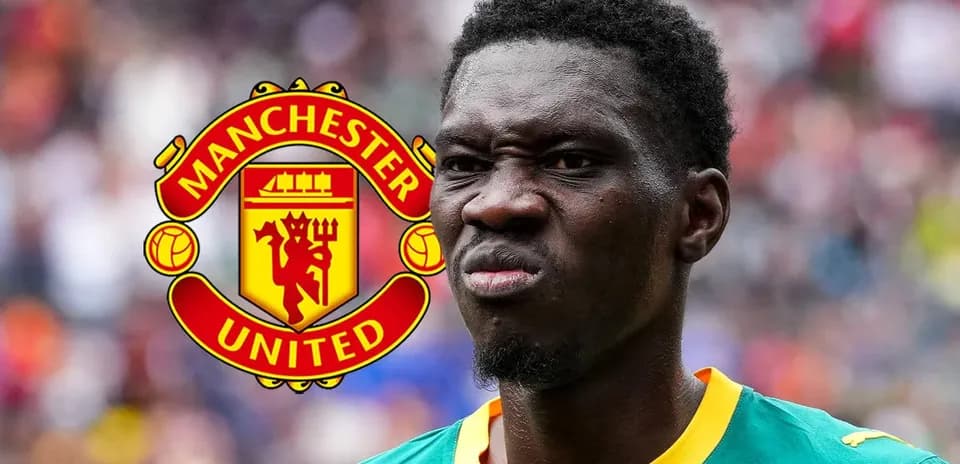 Player in Manchester United kit with logo background