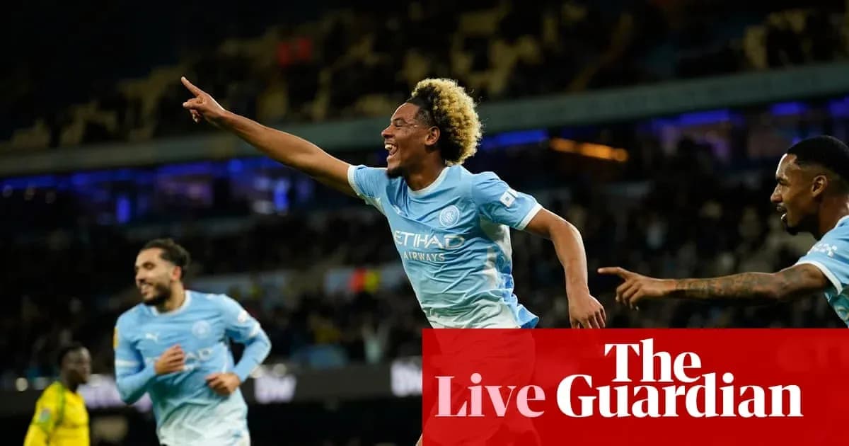 Player celebrating a goal during Manchester City match