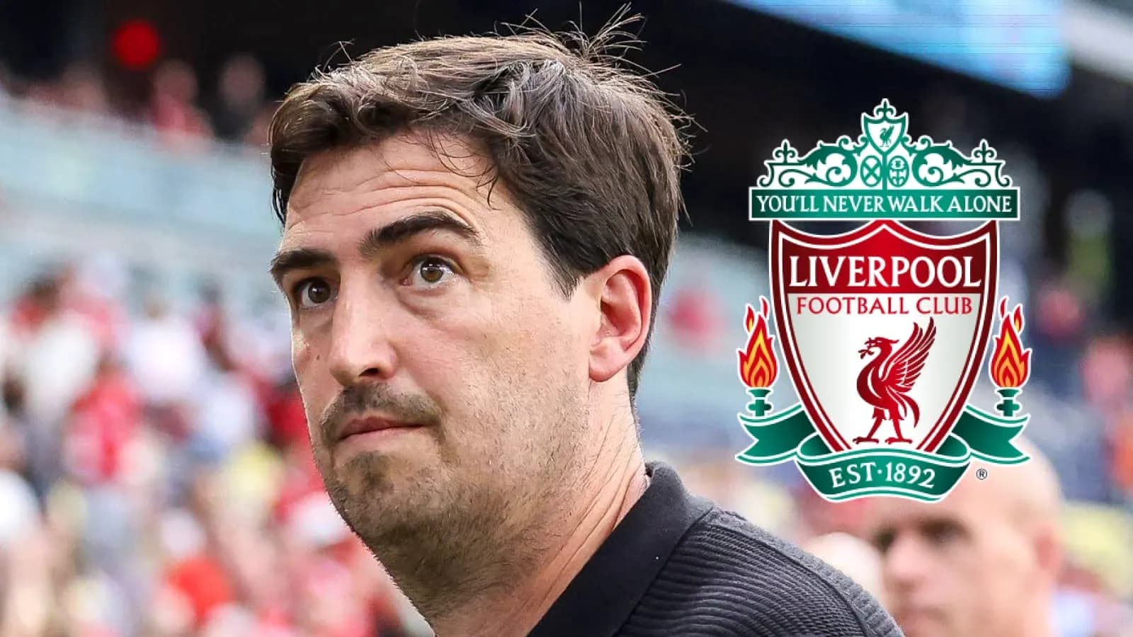 Coach with Liverpool FC logo in background
