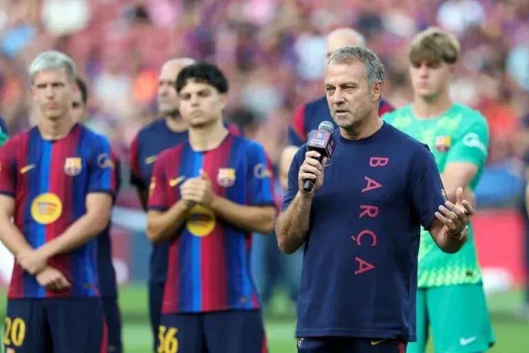 Manager speaking with players during team presentation event
