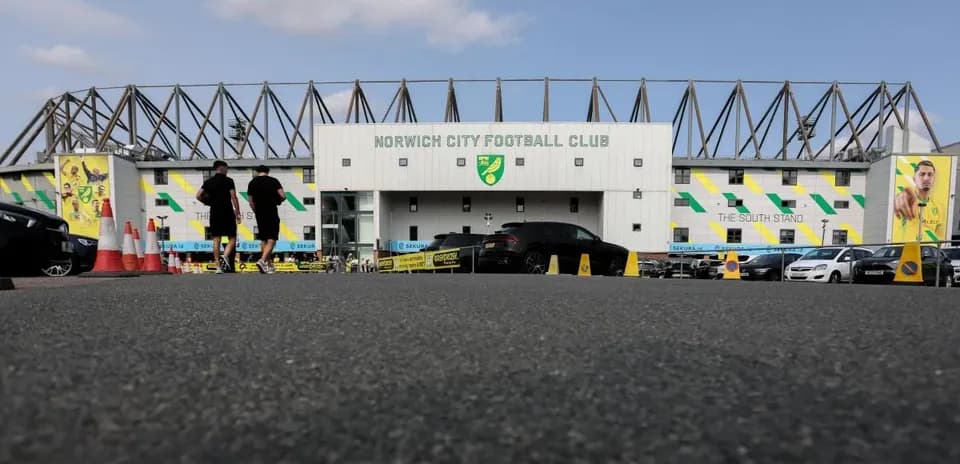 Fans walking towards Norwich City Football Club stadium