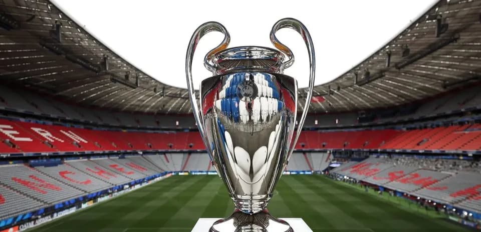 Champions League trophy in stadium before match