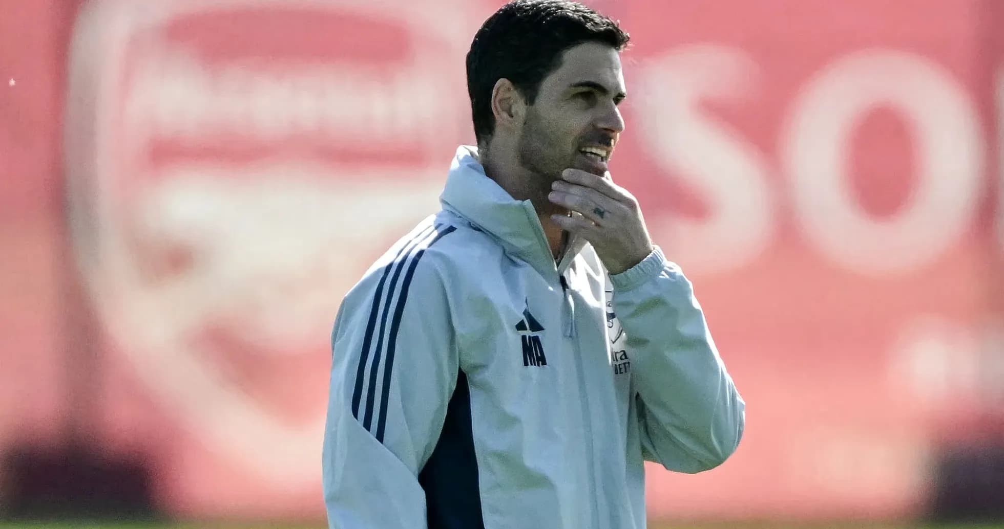 Manager observing training session at Arsenal facility