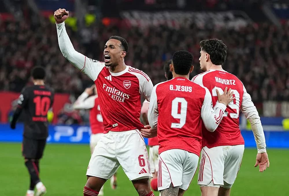 Arsenal players celebrating during UEFA match