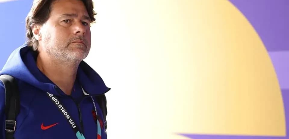 Coach walking in venue with FIFA World Cup credentials