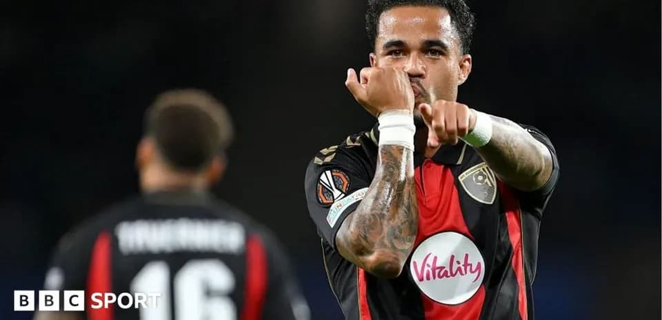 Player celebrating a goal with hand gesture