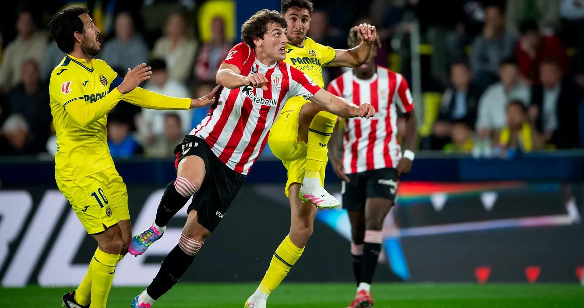 Athletic Club player challenged by Villarreal opponent