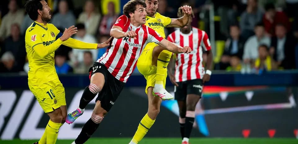 Athletic Club player challenged by Villarreal opponent