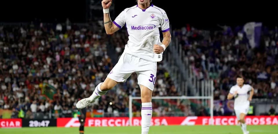 Fiorentina player celebrating a goal on the pitch