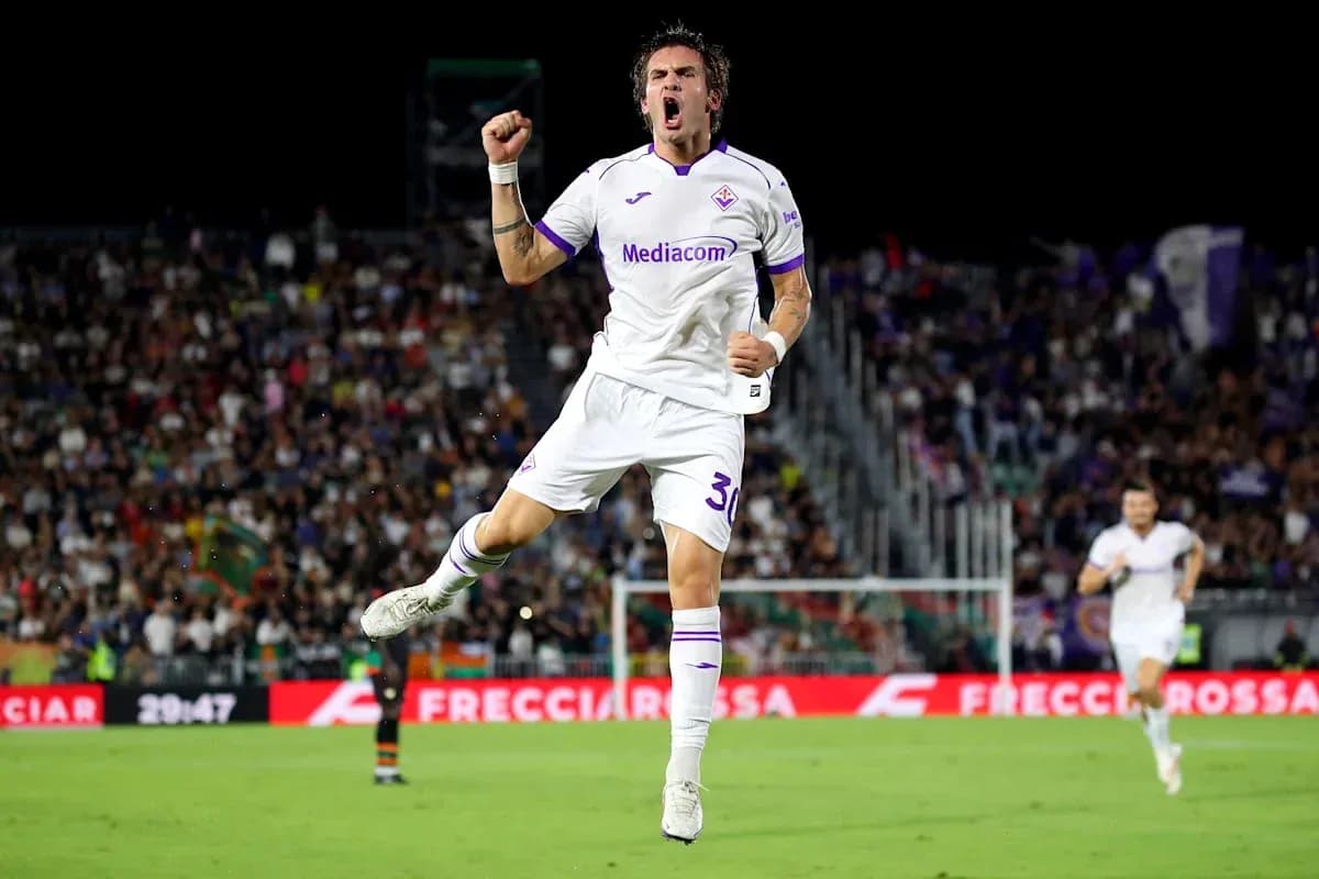 Fiorentina player celebrating a goal on the pitch