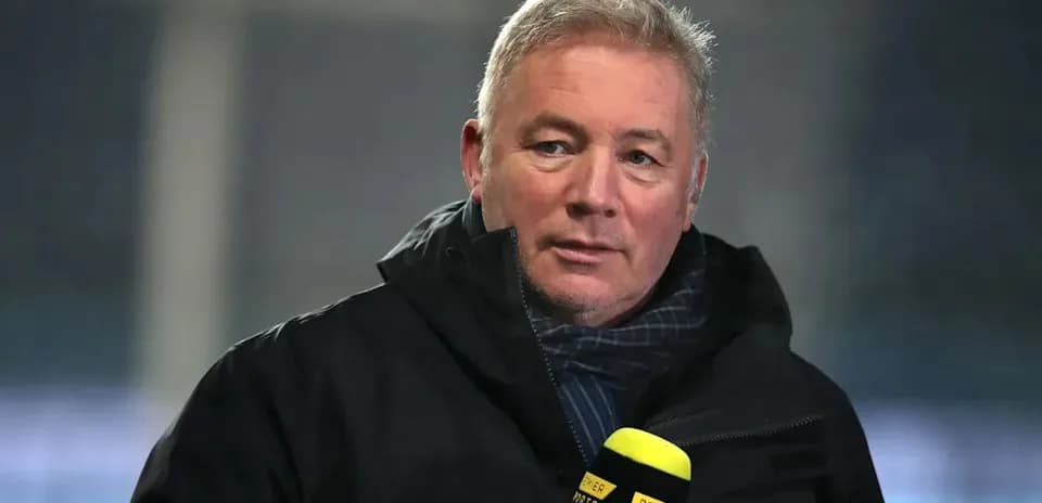 Sportscaster speaking into microphone during interview