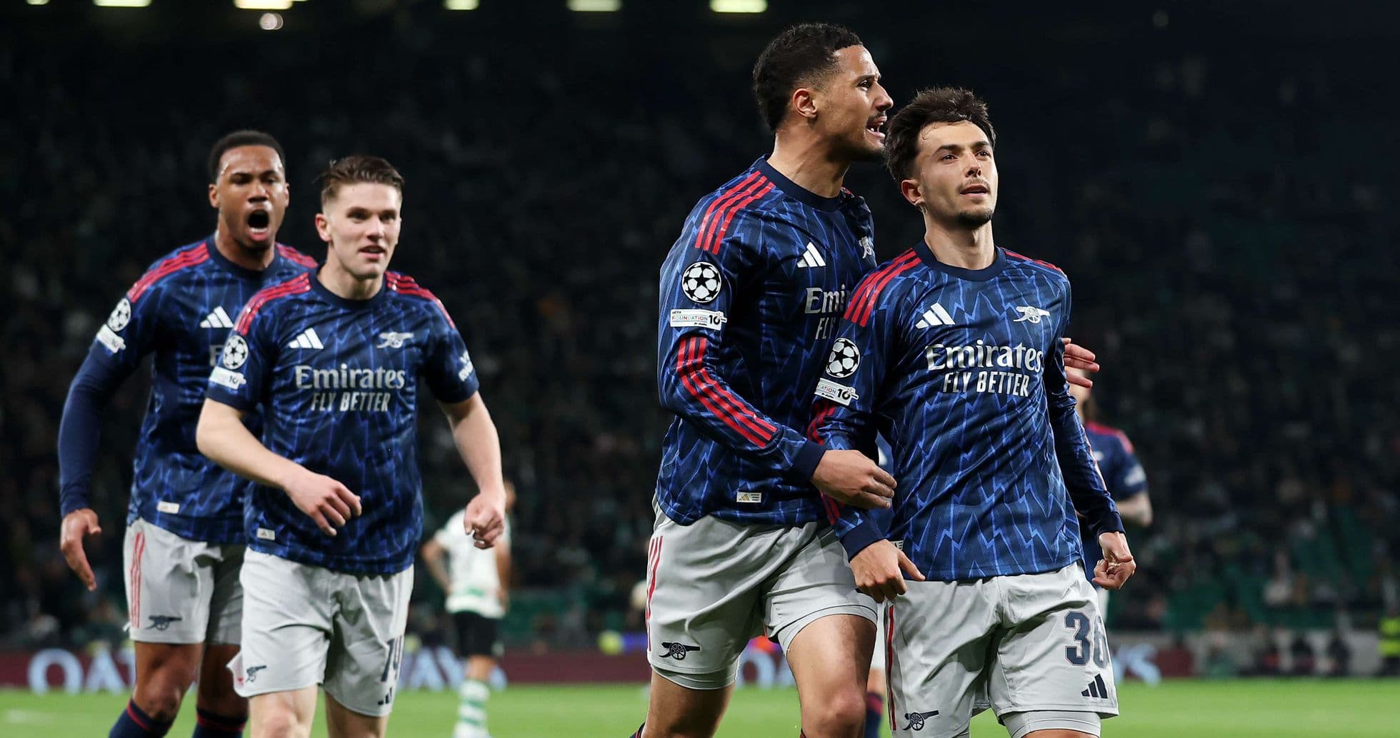 Arsenal players celebrating a goal during match