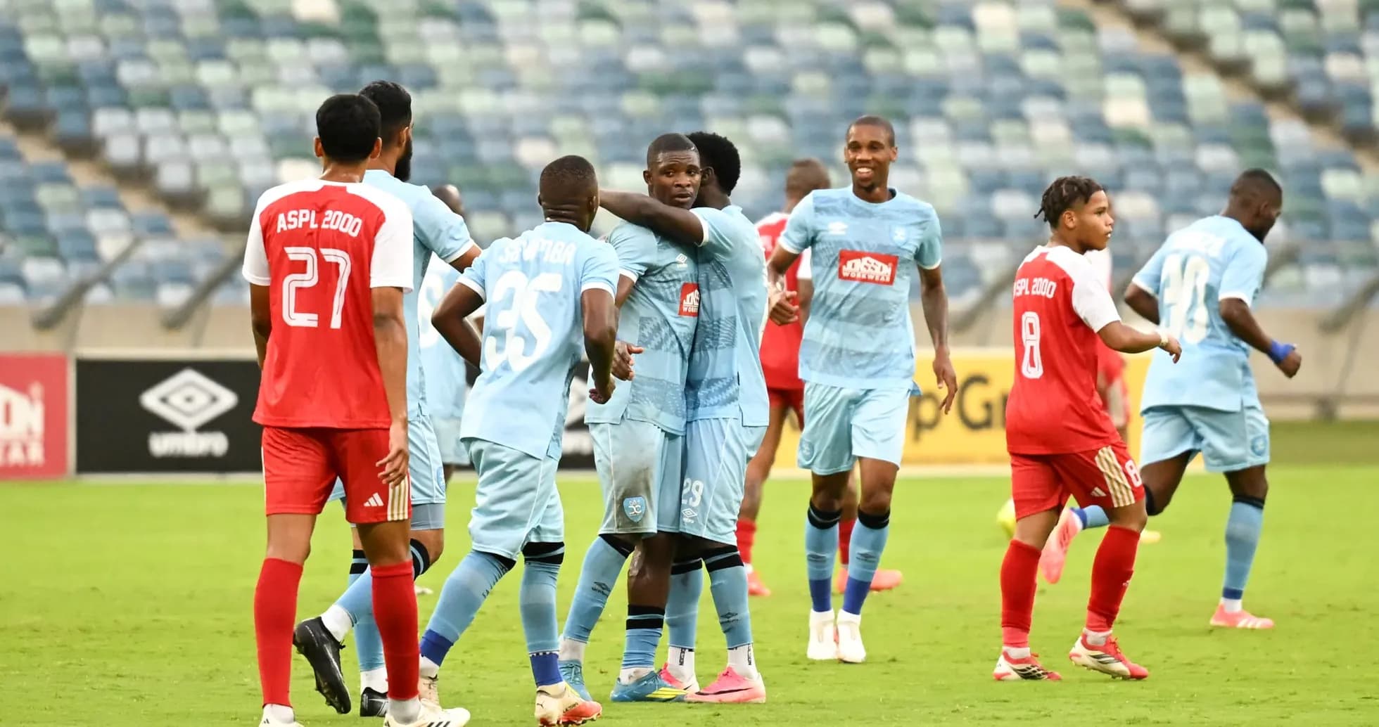 ASPL 2000 players celebrating during match