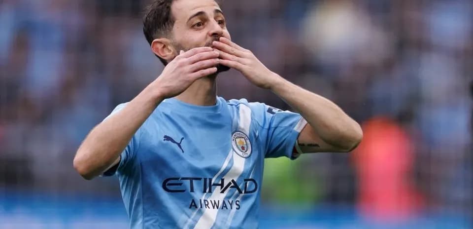 Player celebrating during match in Manchester City kit
