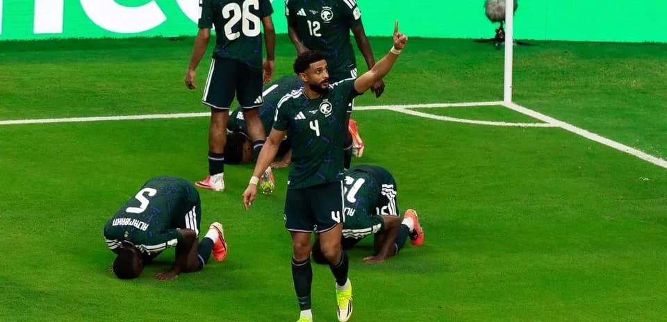 Saudi players celebrating during World Cup match
