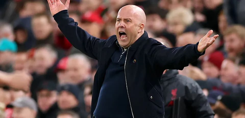 Manager gesturing during a football match