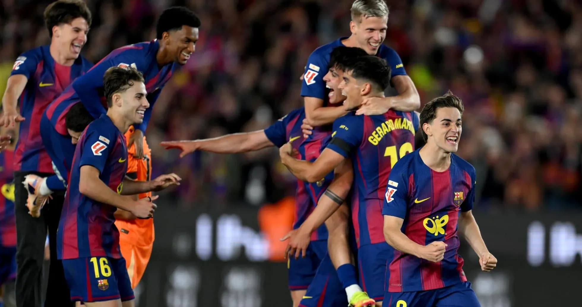 Barcelona players celebrating a goal during match