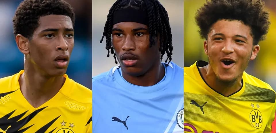 Three football players in club jerseys posing together