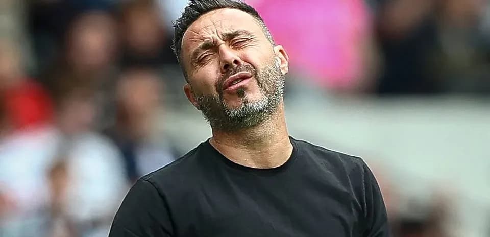 Manager reacting during a tense moment on the sidelines