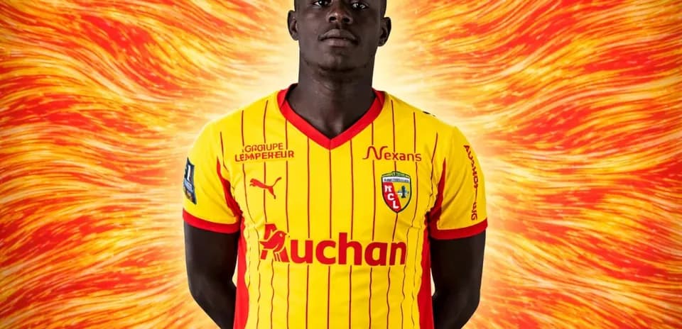 Player wearing yellow and red team jersey