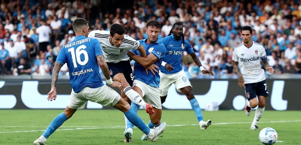 Players contesting for the ball during Napoli match