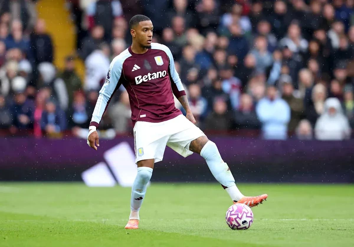 Player in Aston Villa kit controlling the ball