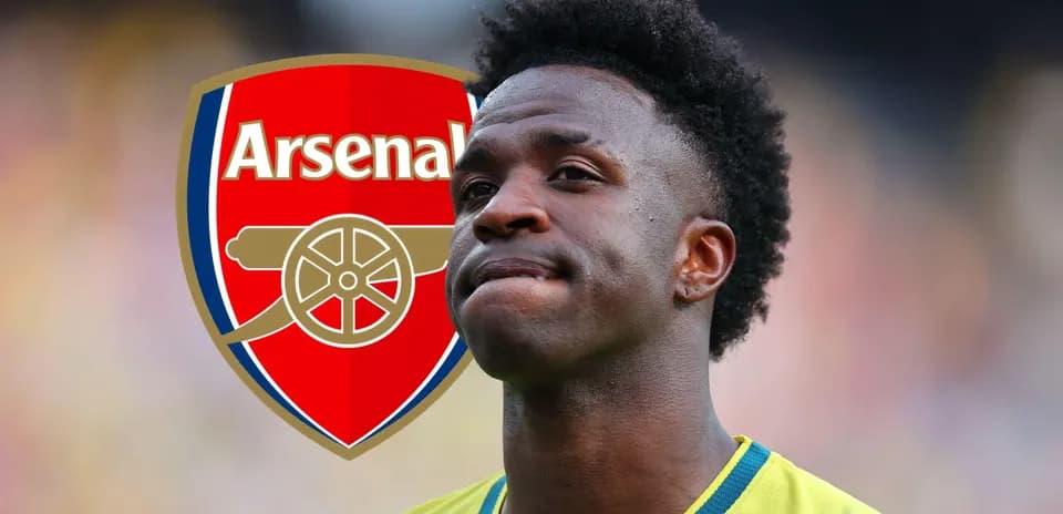 Player with Arsenal logo in background