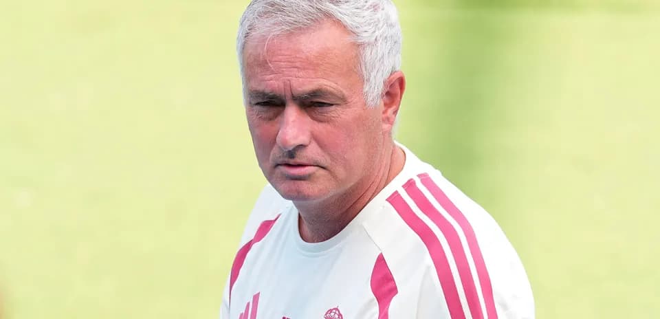 Coach observing during training session on field