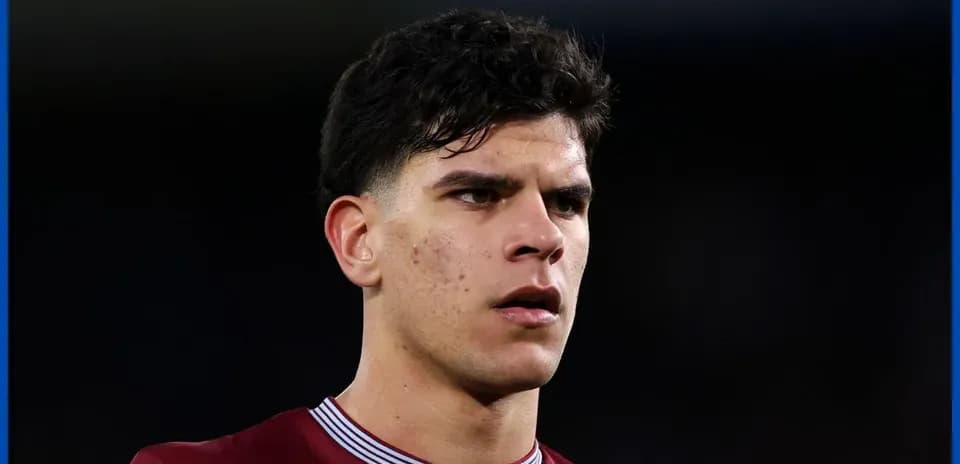 Player in maroon jersey during a match