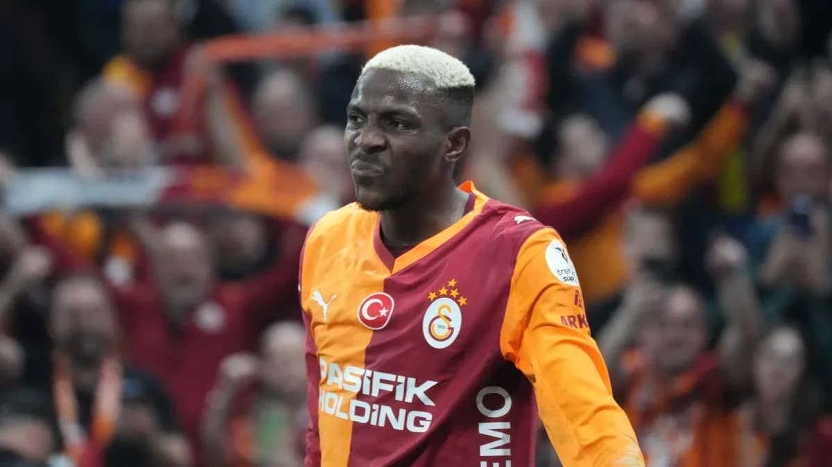 Player celebrating a goal for Galatasaray during match