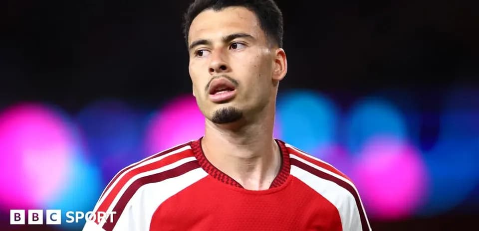 Arsenal player during match with blurred background